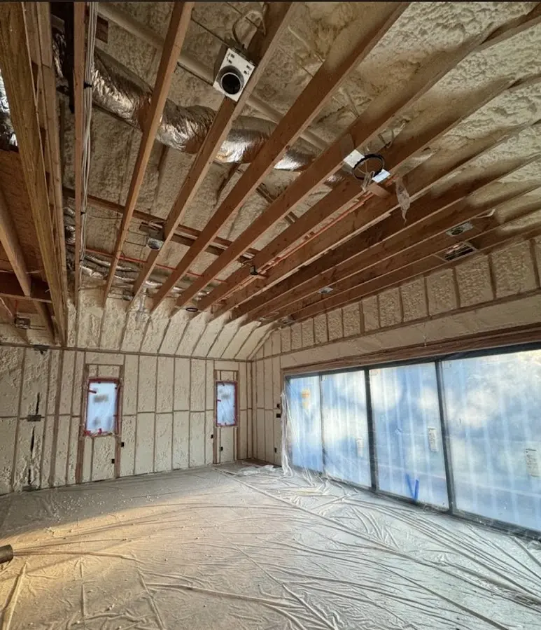 Interior walls and ceiling insulated with spray foam during new construction in Quakertown